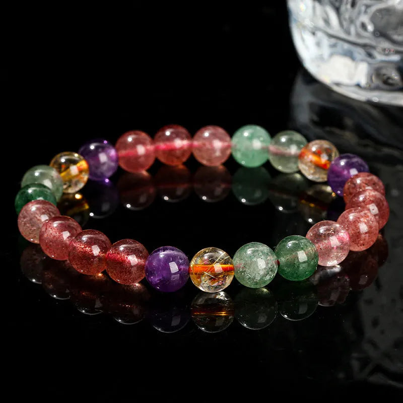 A women's bracelet with pink strawberry quartz and natural tourmaline beads in geometric shapes, showing 7mm, 8mm, and 9mm size options.