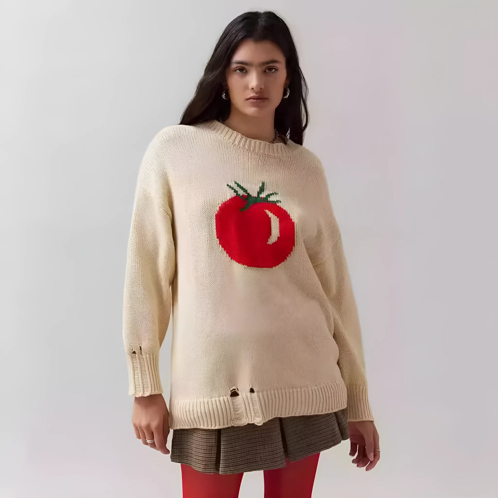 Women's milky white acrylic jacquard pullover sweater with round neck and long sleeves laid flat.