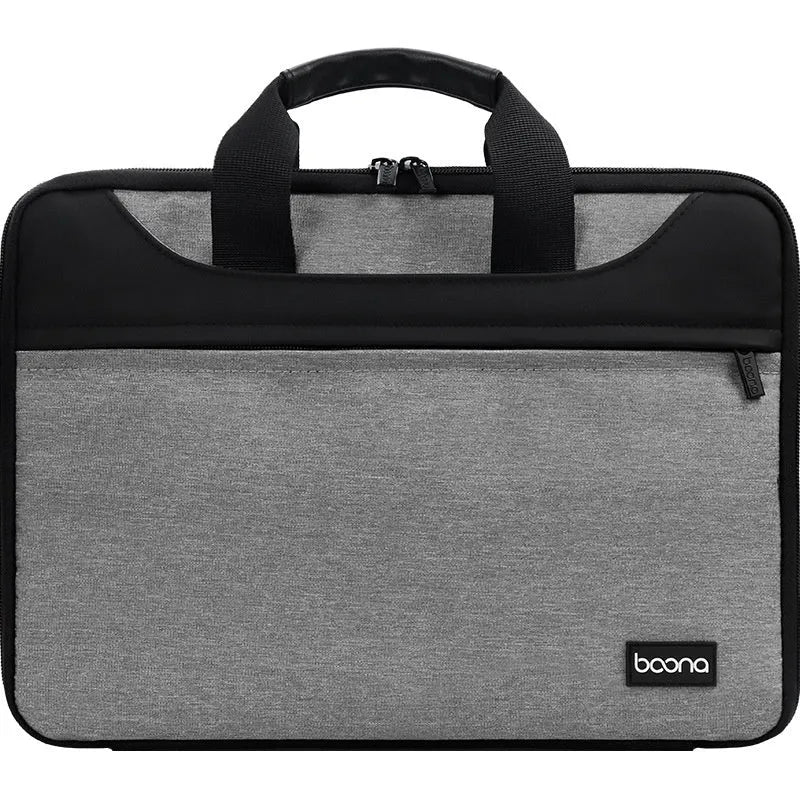 Black Oxford cloth laptop bag with soft carry handle showing laptop compartment and business travel use