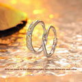 Pair of copper electroplated meteor shower star couple rings with adjustable opening on a flat surface