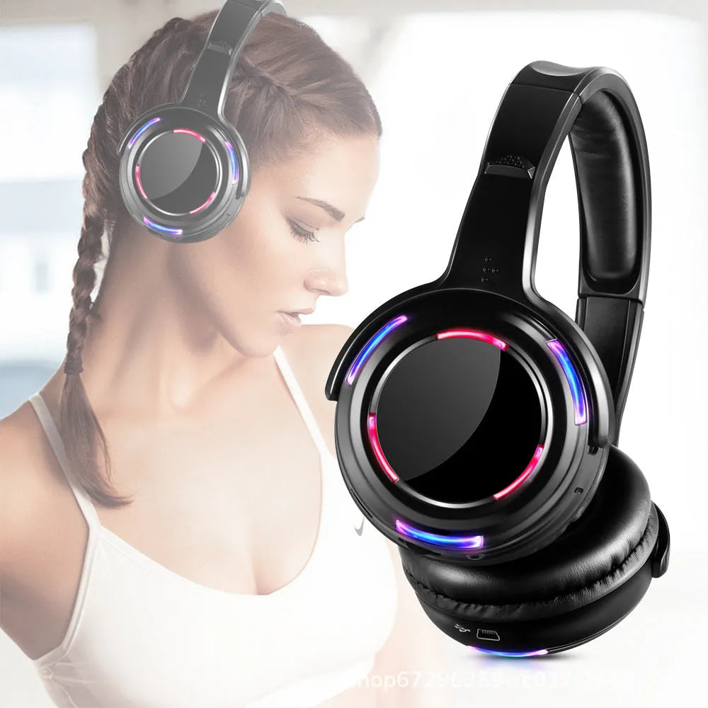 Black over-ear silent disco wireless headphones with a 3-metre cable and 3.5mm plug for party events.