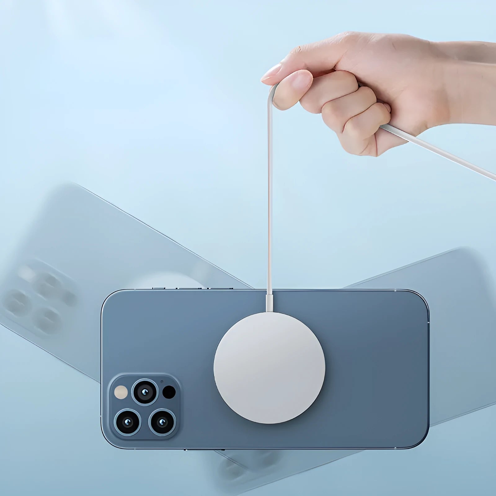 Round 15W magnetic wireless charger disc in white, black, and transparent finishes on a desk