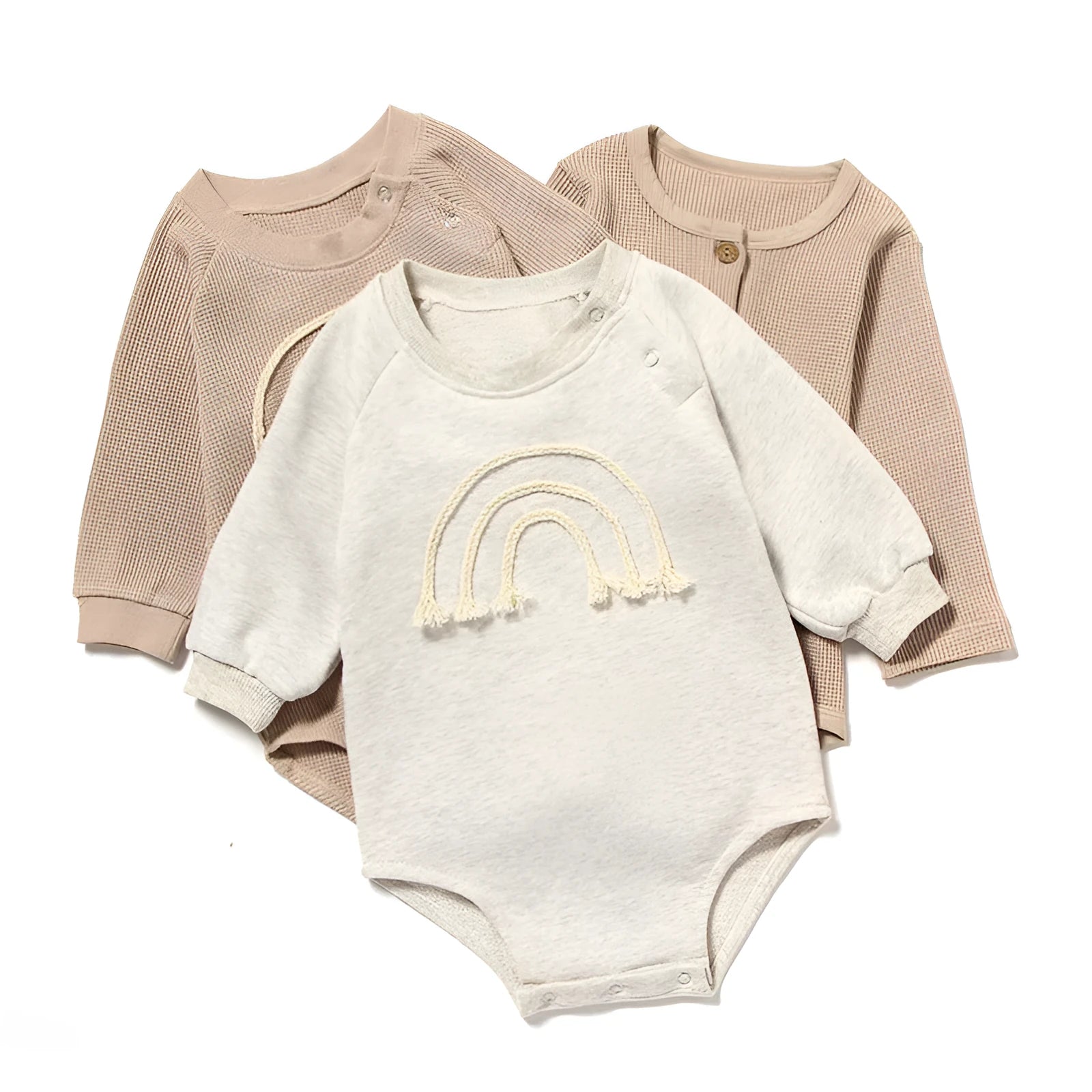 Beige waffle cotton baby romper with long sleeves and cotton rope tie fastening.