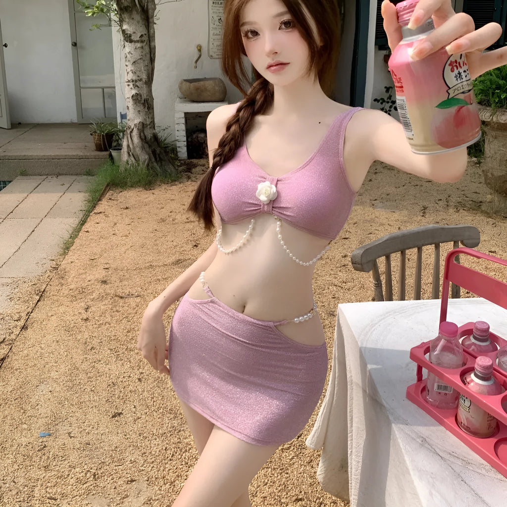 Women's pink and black three-piece polyester bikini for swimming and hot springs.