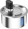 Stainless steel cat water fountain with heating base on a table.