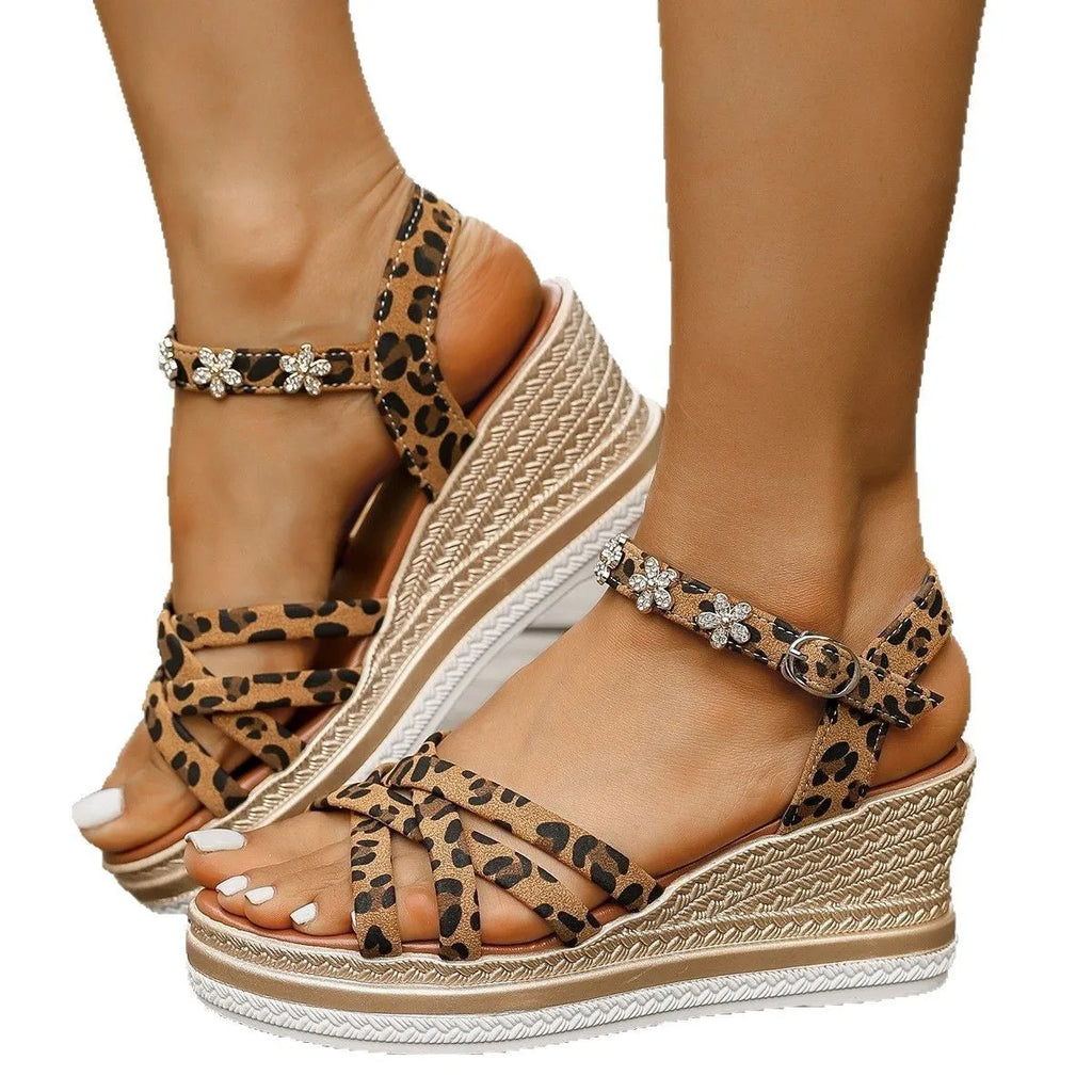 Light brown suede women's sandals with an ankle buckle and platform sole.