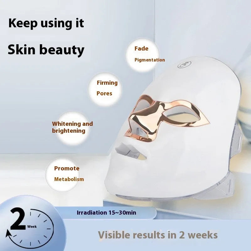 Rechargeable LED beauty mask with touch controls on a white gold edge finish.