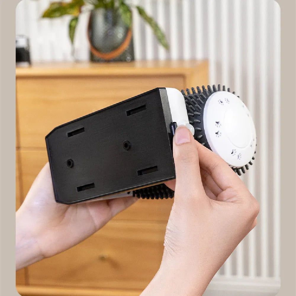 White automatic cat self groomer mounted in corner with silicone bristles for brushing