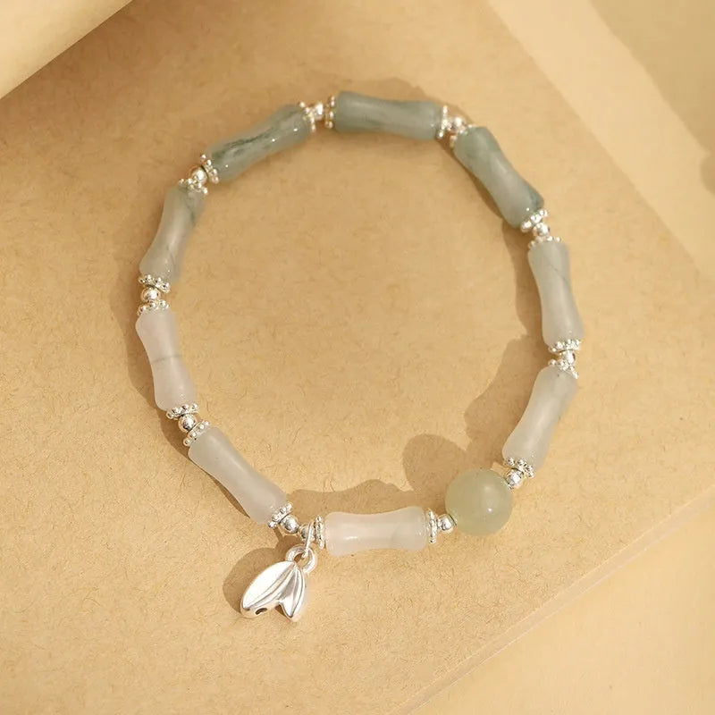 Handmade women's bracelet with Tianshan green bamboo and sterling silver in antique style