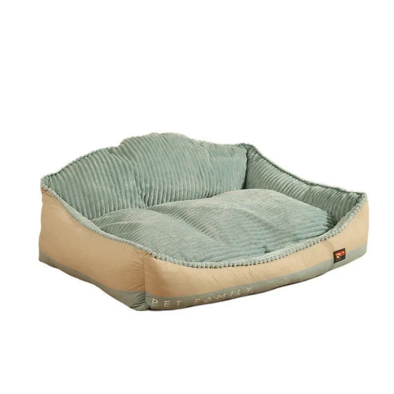 Large grey washable sofa dog bed mat with removable cover on a sofa.