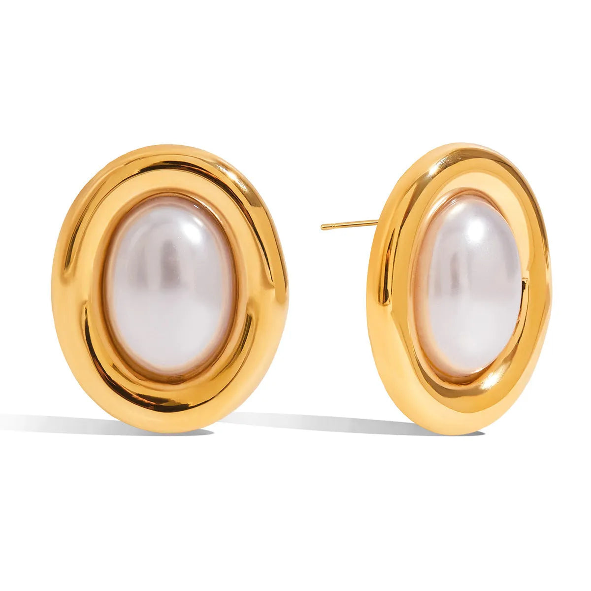 A pair of stainless steel stud earrings with a vintage pearl centre in a silver-tone finish.