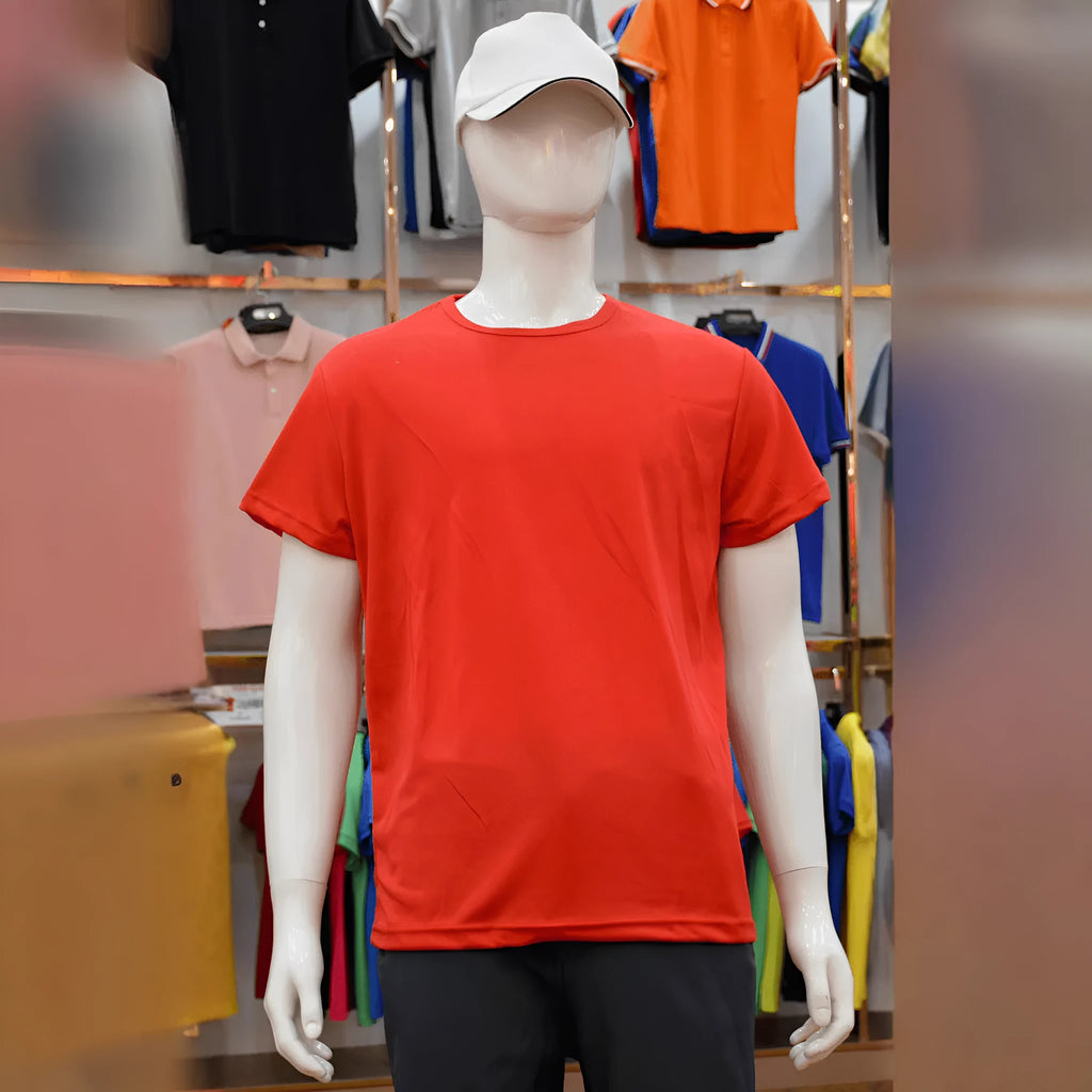 Man wearing a slim fit quick-dry short sleeve T-shirt in a solid colour.