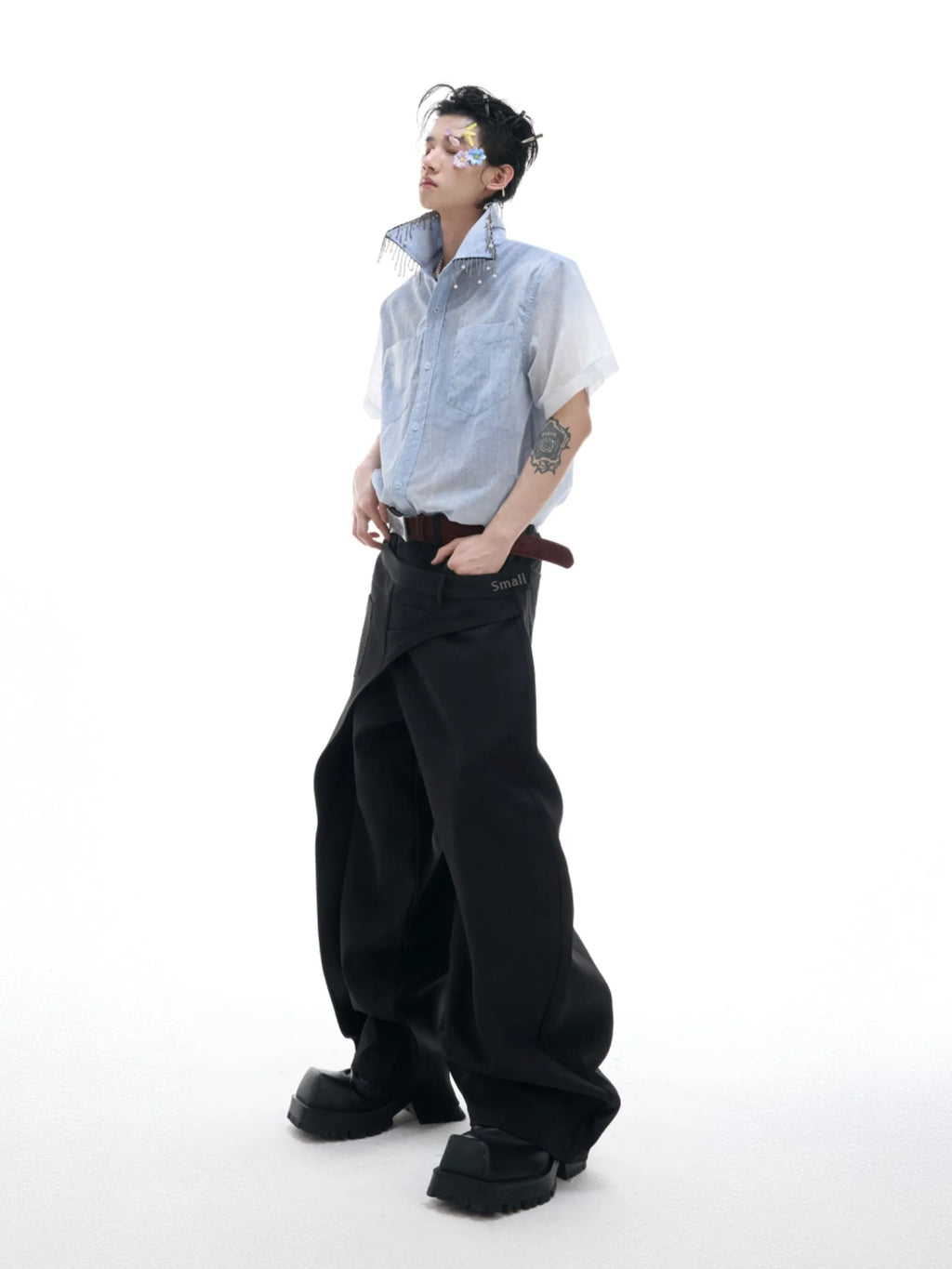 Blue and white gradient loose short shirt with half sleeves on a hanger.