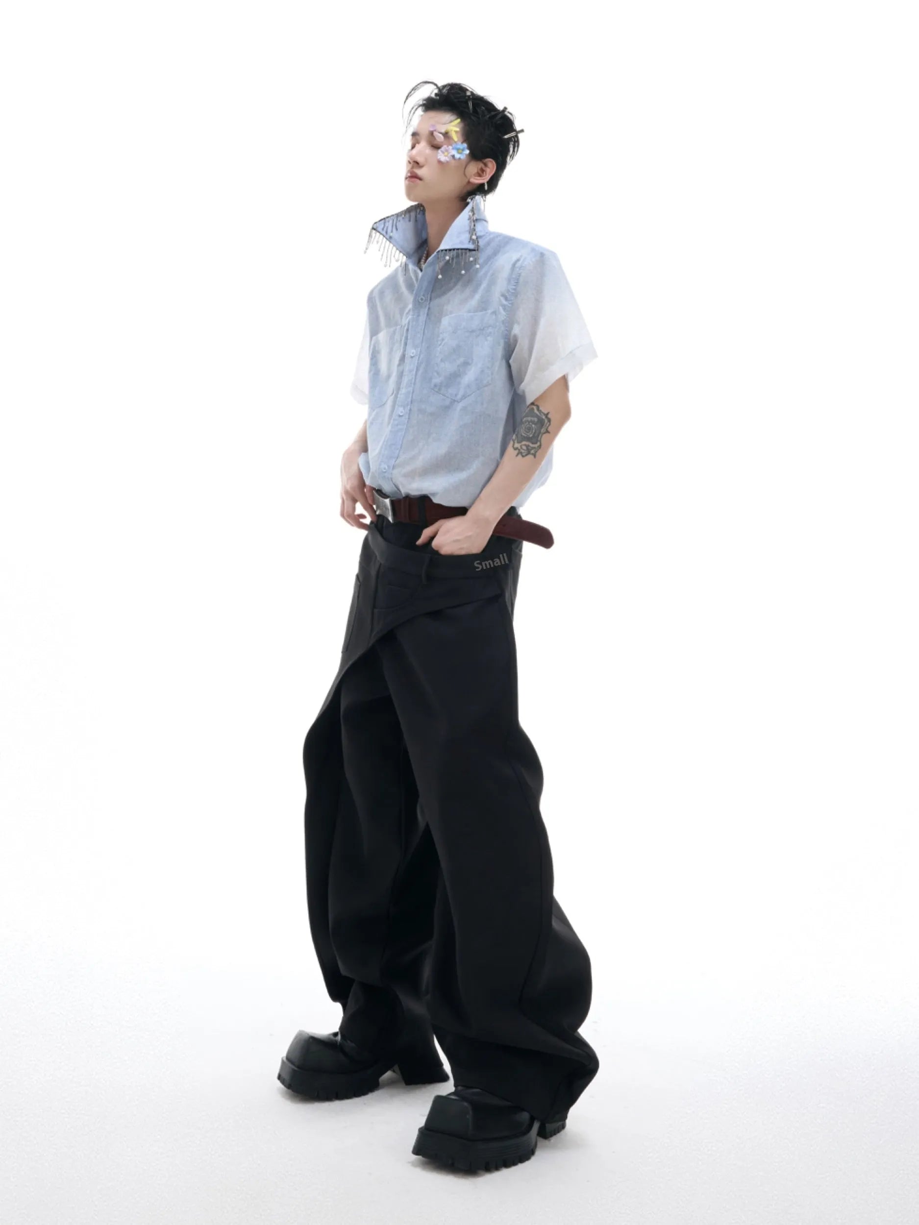 Blue and white gradient loose short shirt with half sleeves on a hanger.