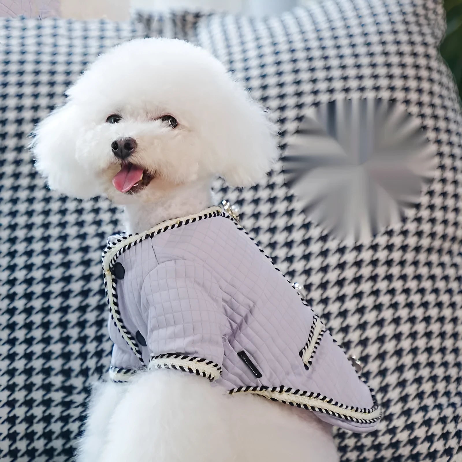 Cartoon-style quilted dog coat in light purple, sized for a medium dog.