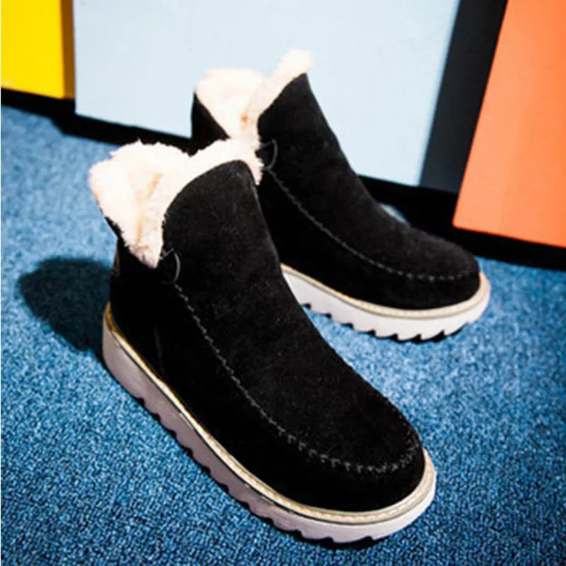 Women's winter snow boots in black with plush flannel lining, rubber sole, mid heel, round toe, ankle-high.