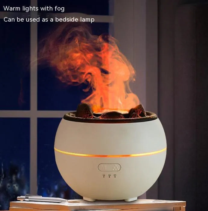 White round ultrasonic aroma diffuser humidifier with timer buttons on a desk.