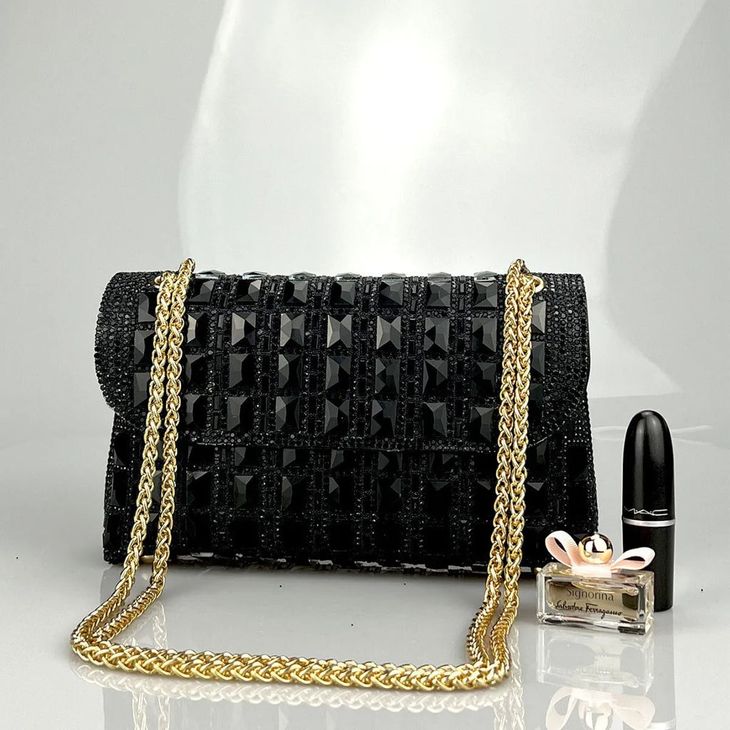 Glass rhinestone chain clutch bag in horizontal square shape with decorative diamonds and chain strap