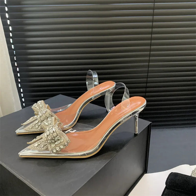 Silver pointed toe high heel sandals with bow and rhinestone detailing, microfiber upper, 6-8cm heel, slip-on