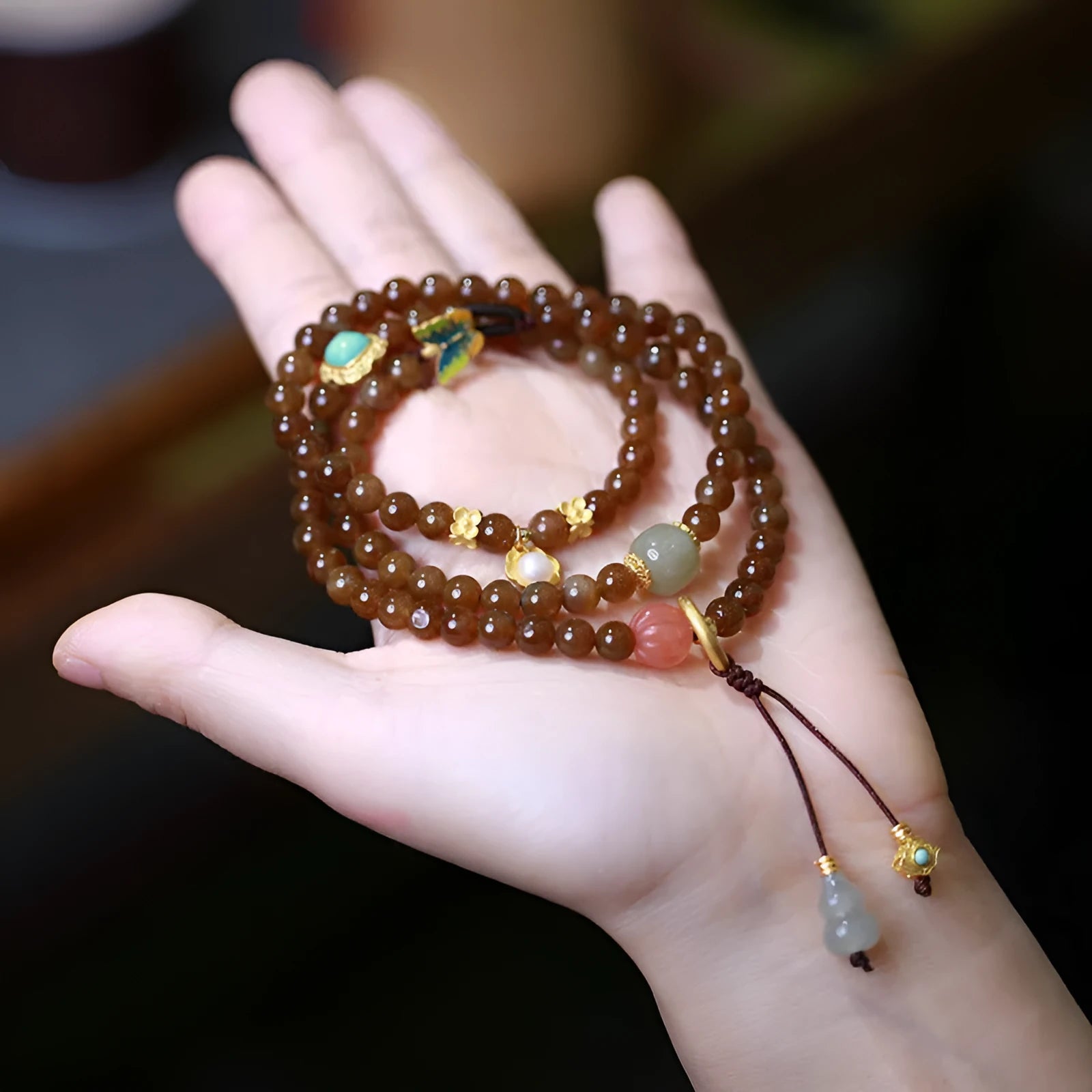 Brown jade Hetian jade three-ring bracelet with butterfly and gourd pearl design