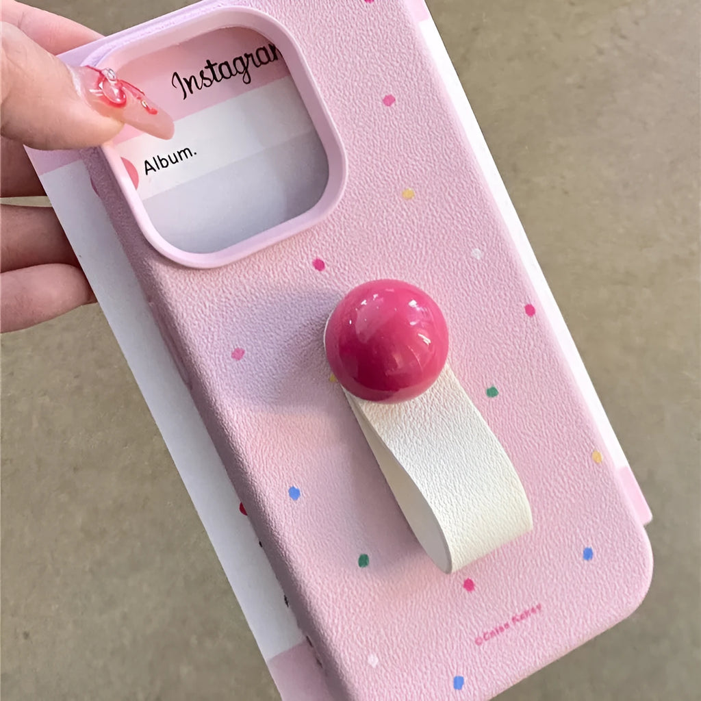 Polka dot silicone phone case with finger ring, frosted finish, for iPhone, pink colour, back view