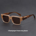 Square sunglasses with thick grey blue frames and UV-protective lenses