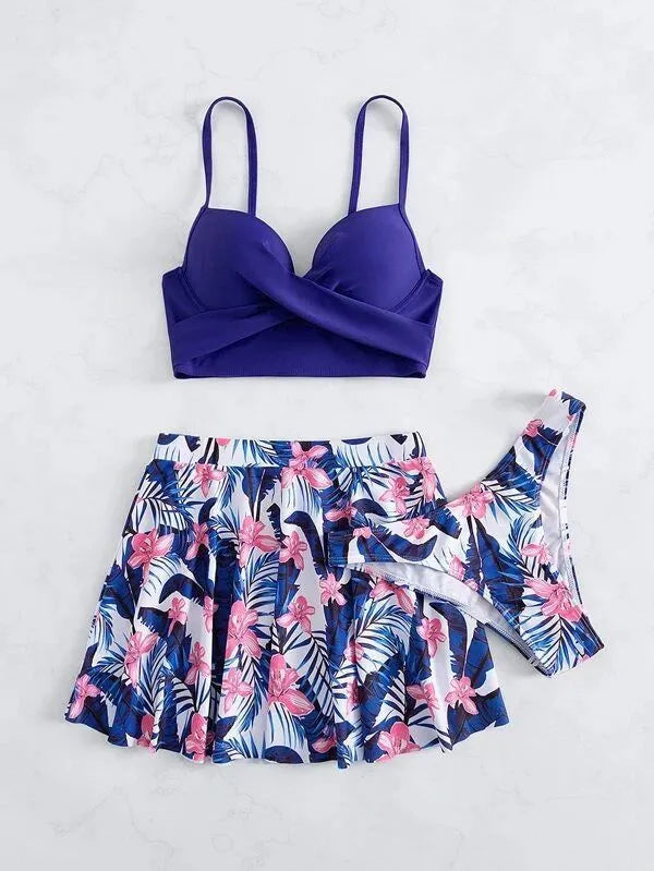 Women's high-waisted three-piece bikini swimsuit set in polyester fabric with belly coverage