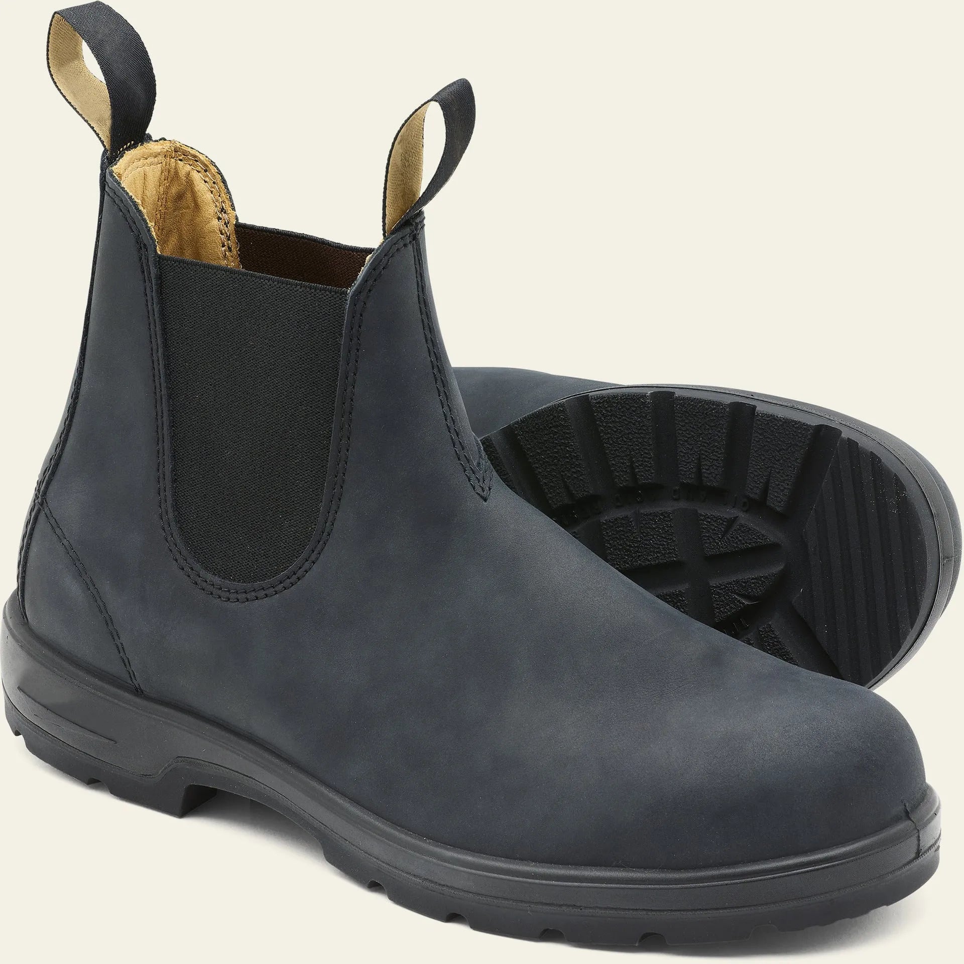 Brown vintage unisex Chelsea boot with car suture stitching and a round toe.