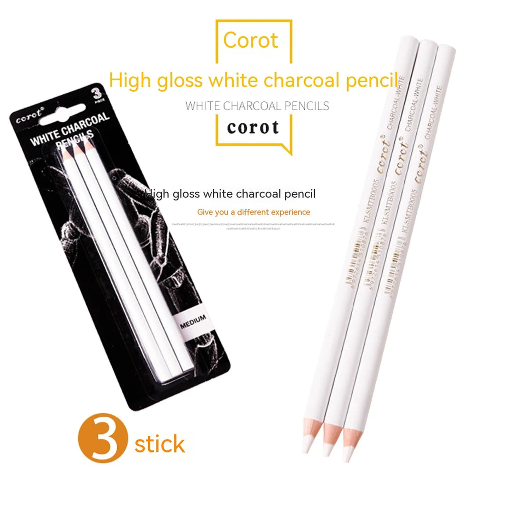 Set of three white charcoal sketching pencils in wooden casings.