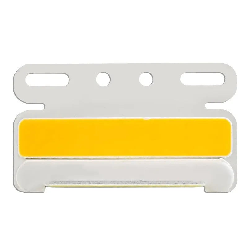Waterproof aluminium alloy LED side light for trucks, showing bright COB illumination in blue, mounted near a vehicle tyre.