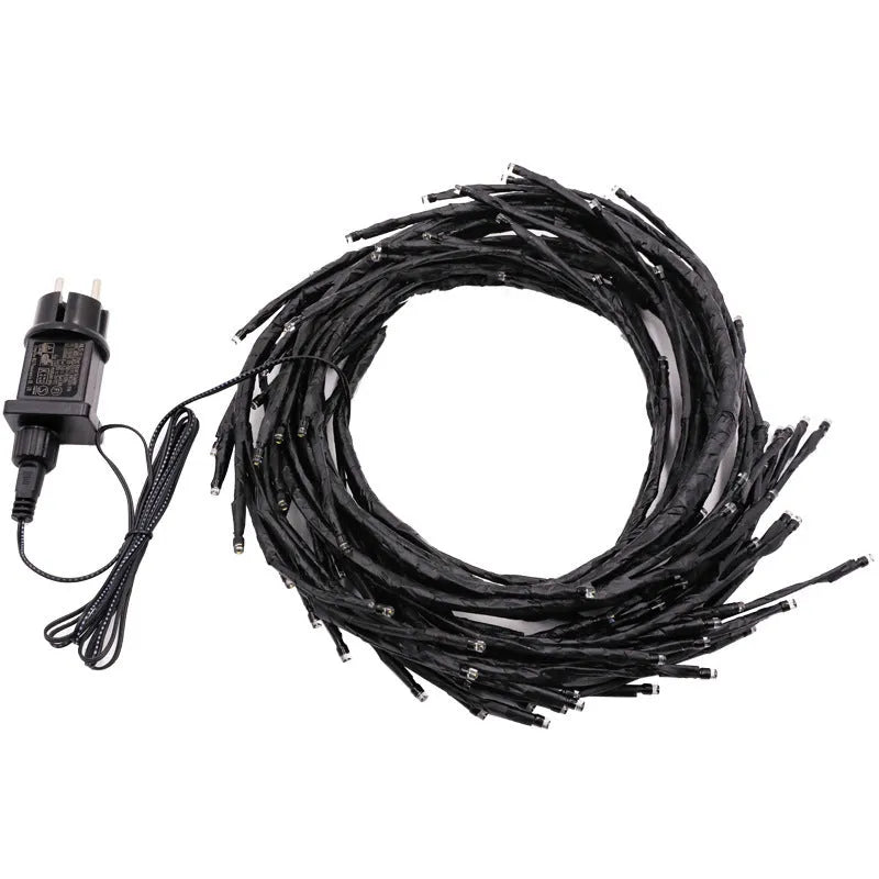 Rattan-style LED tree light with warm white illumination for room decoration