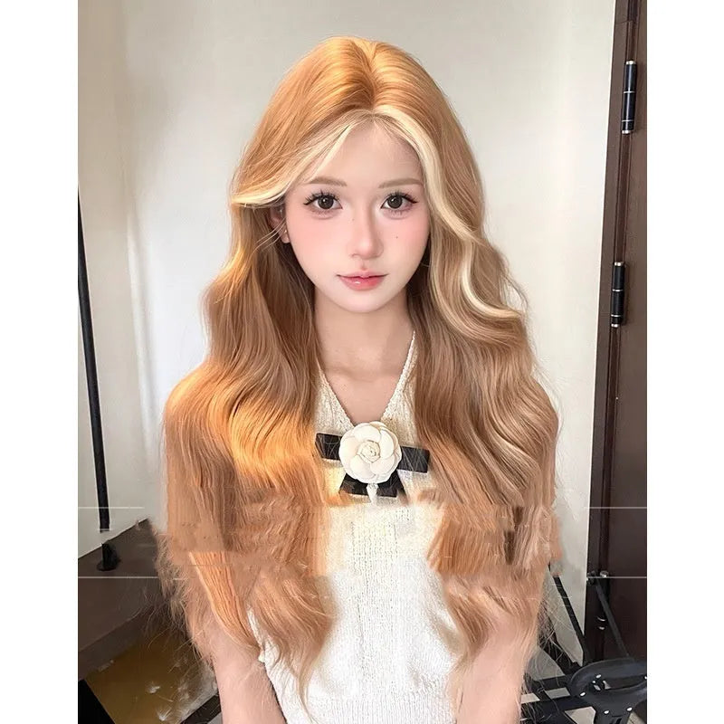 Long curly lace wig in American dyed gold colour showing full head coverage and natural hairline