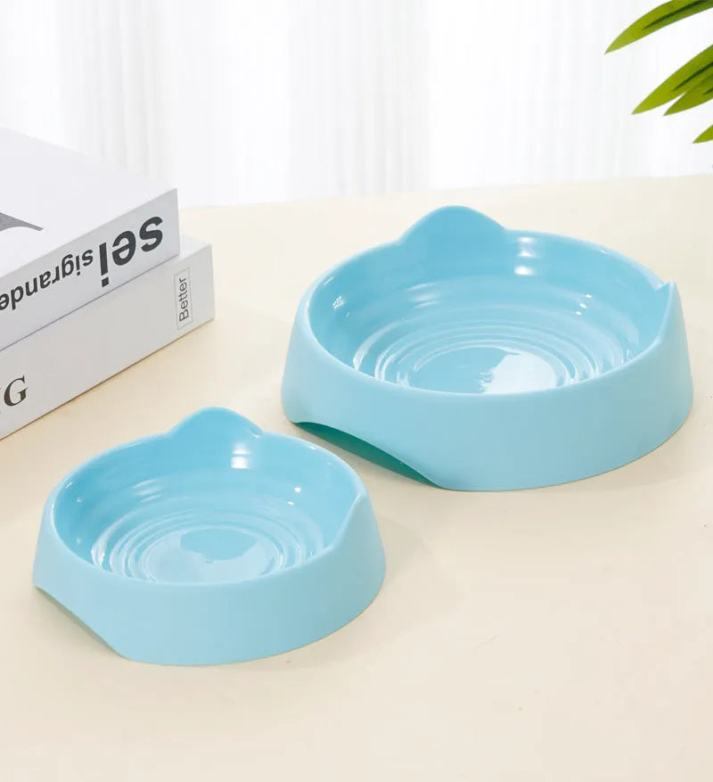 Blue ceramic dog slow feeder bowl with raised maze pattern for fast-eating dogs.