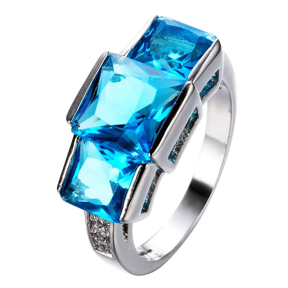 Colourful electroplated copper women's ring in a simple geometric design, showing multiple colour options.