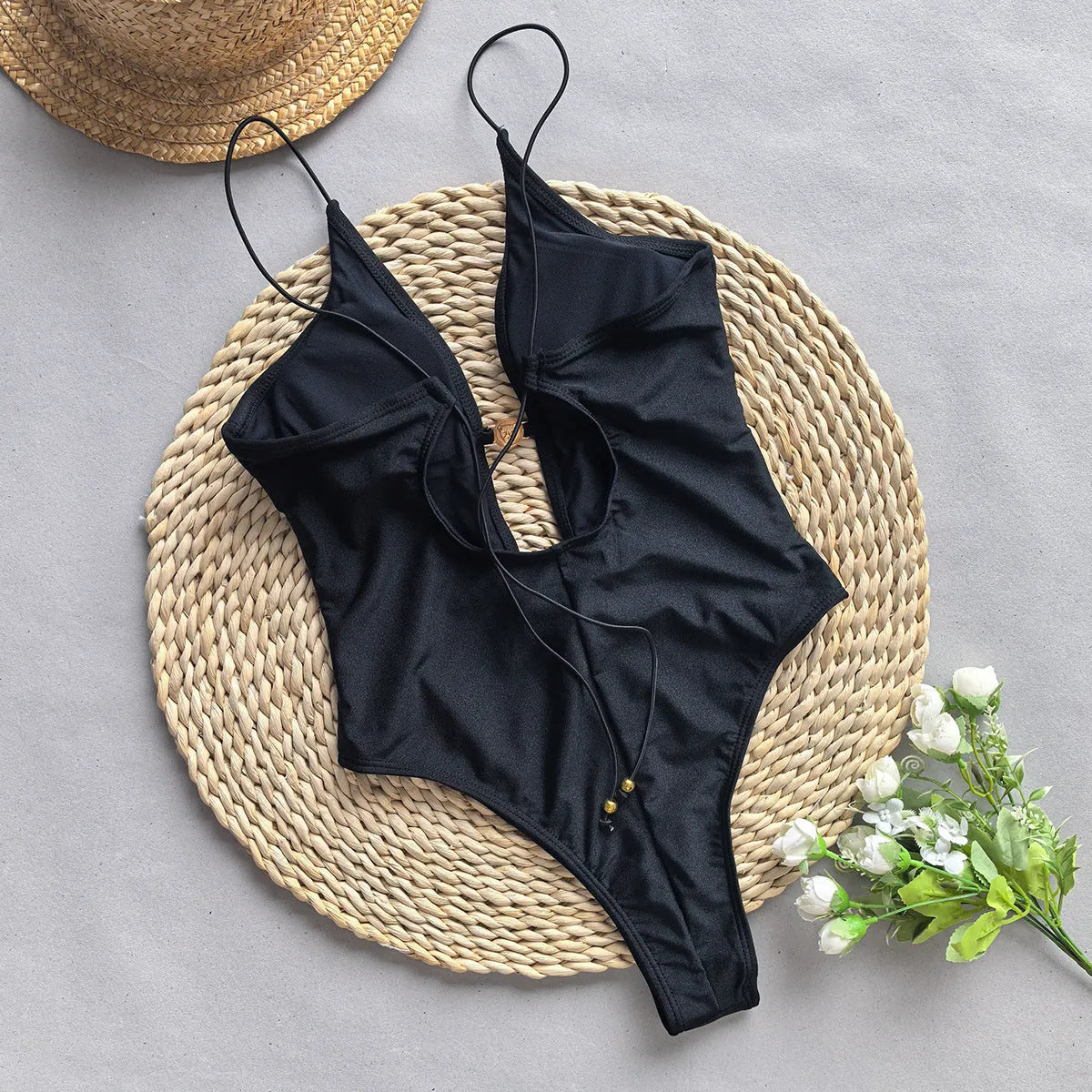 Women's solid colour one-piece swimsuit with high elasticity, shown in a European and American bikini style.