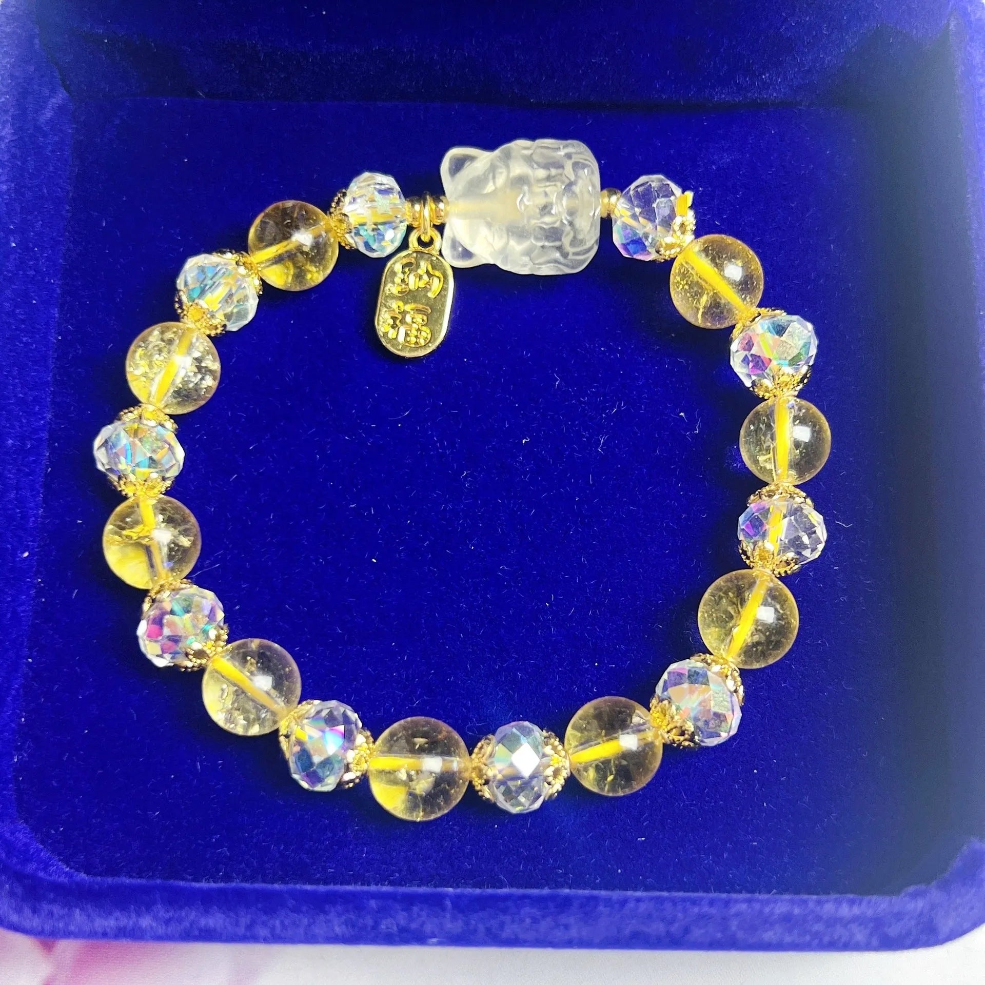 Handmade women's bracelet featuring a nine-tail fox design made from natural citrine crystals.