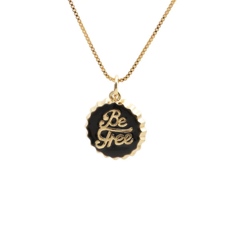 Copper bottle cap pendant necklace with 18K gold plating on a 40 cm box chain.