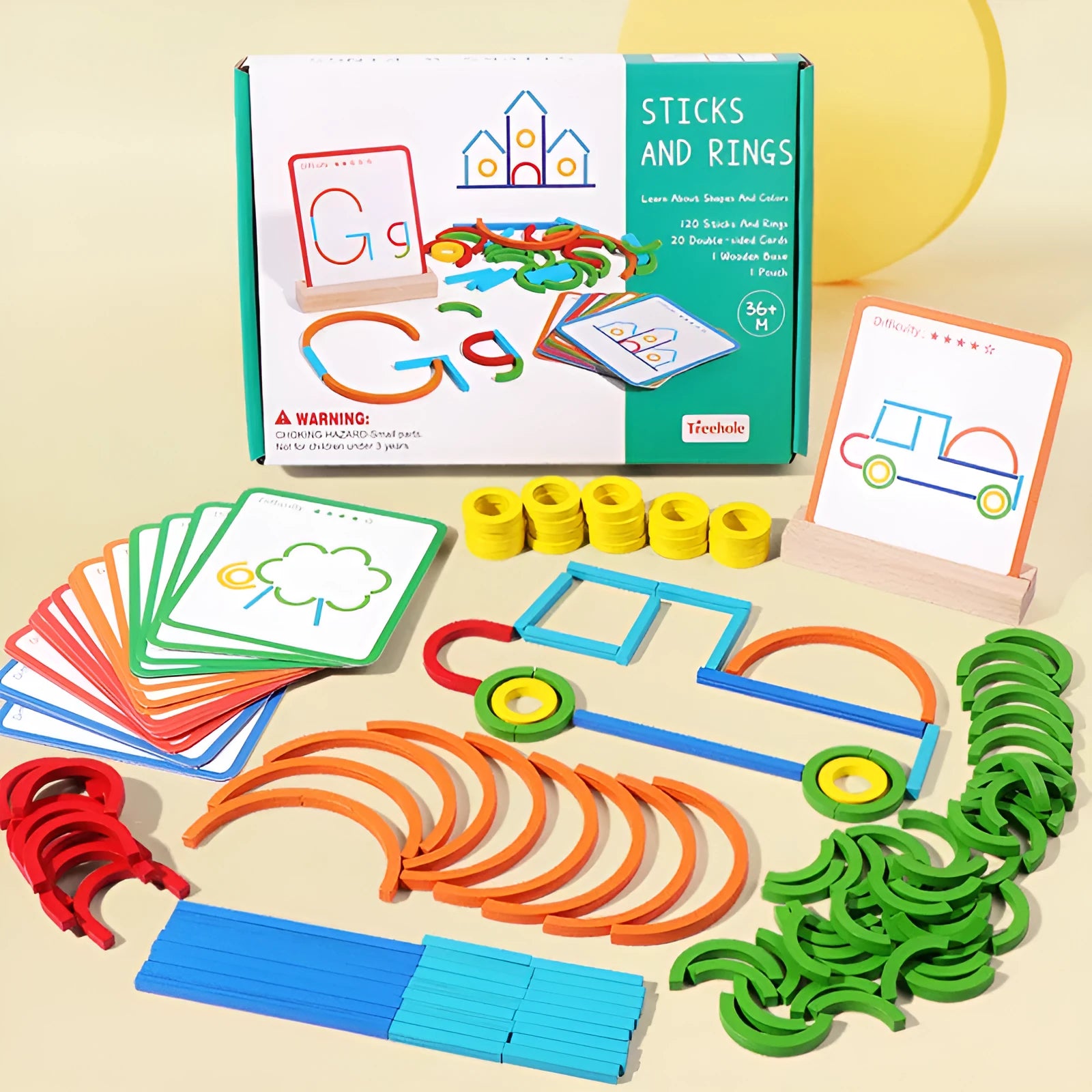 Children's wooden thinking training puzzle with creative stick and ring pieces on illustrated board, colour box packaging