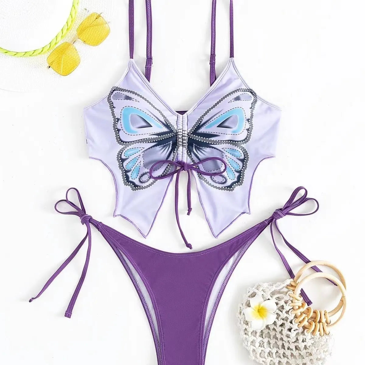 Women's purple bikini set with bow style top and high-cut briefs for swimming and fitness