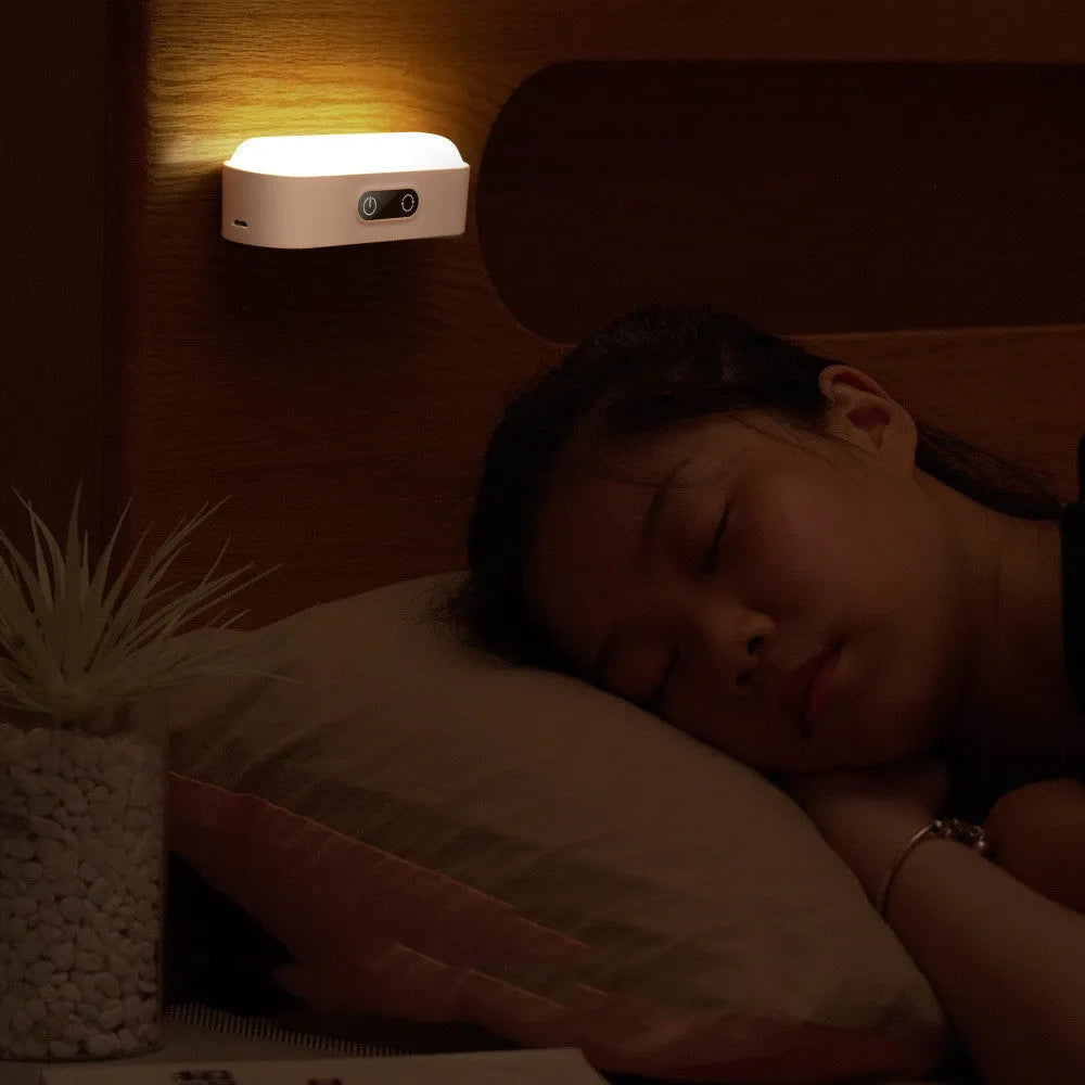 White magnetic USB rechargeable LED night light with touch controls mounted on study cabinet