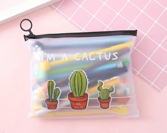 Set of 20 black 0.5mm cartoon design pens next to a 21x17cm cactus-themed plastic pencil case.