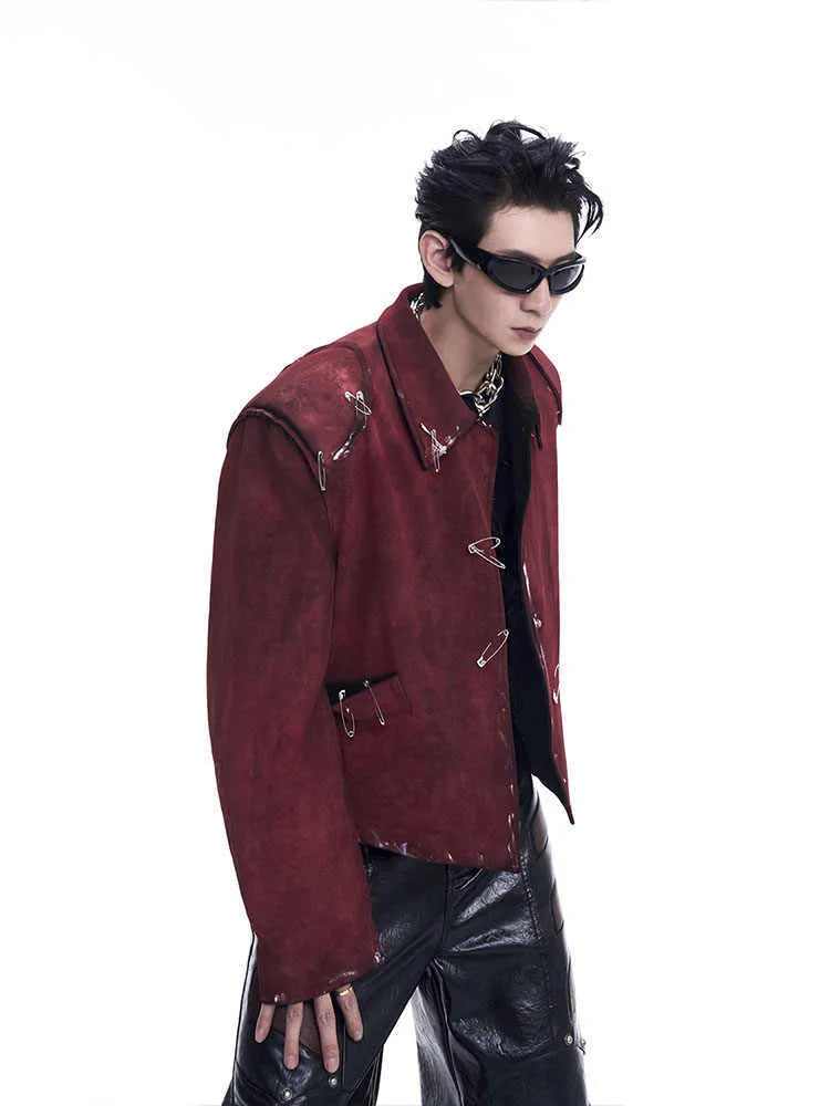 Red men's quilted jacket with decorative flocking pins and lapel collar in loose-fit style