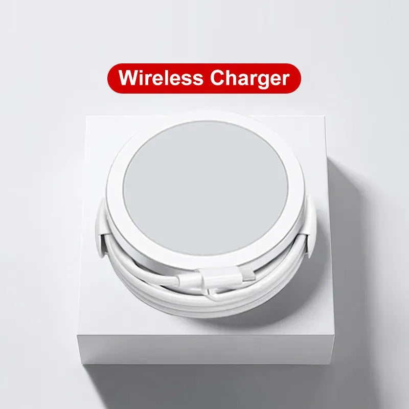 Round 15W magnetic wireless charger disc in white, black, and transparent finishes on a desk