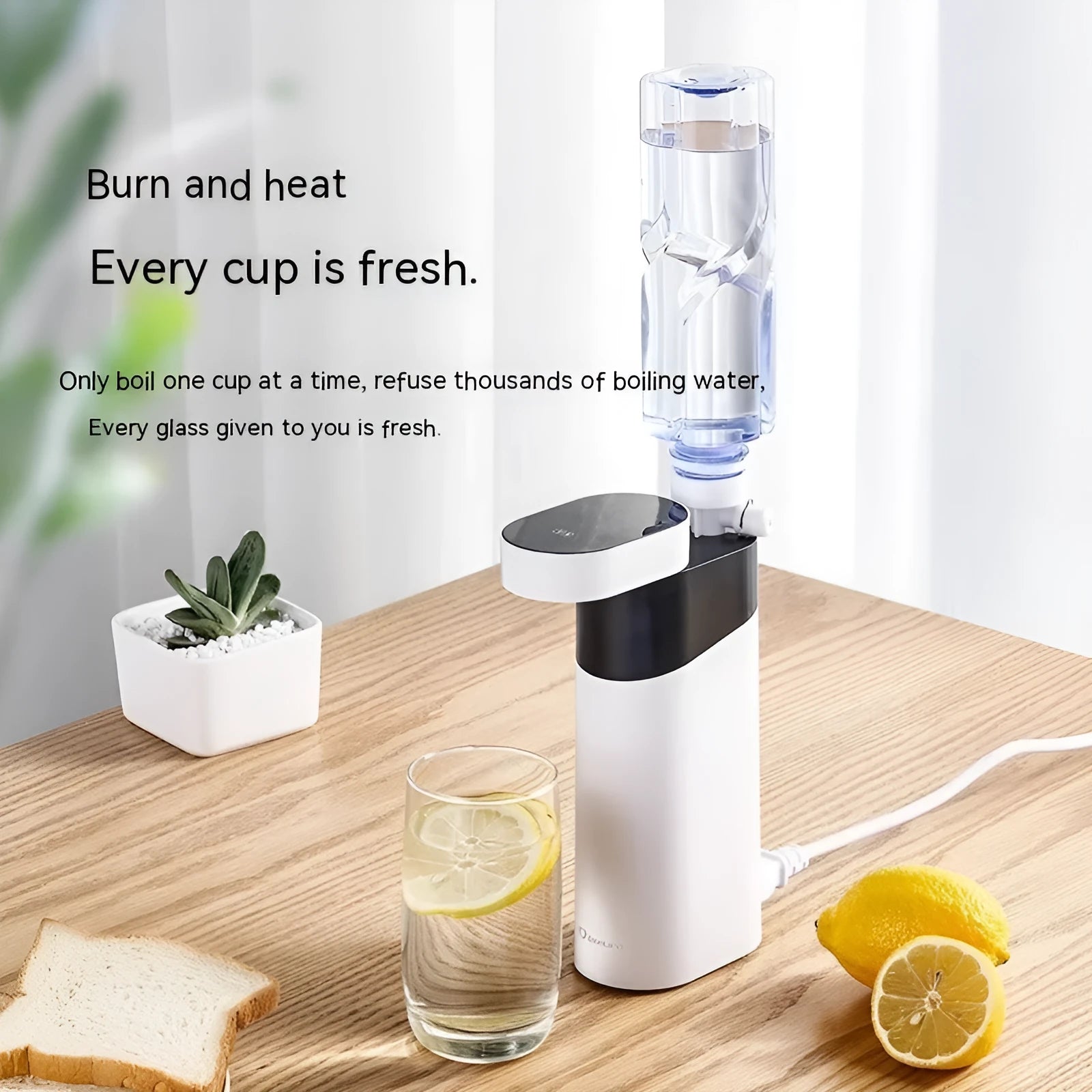 Small black or green instant hot water dispenser with Nano heating film on a desktop.