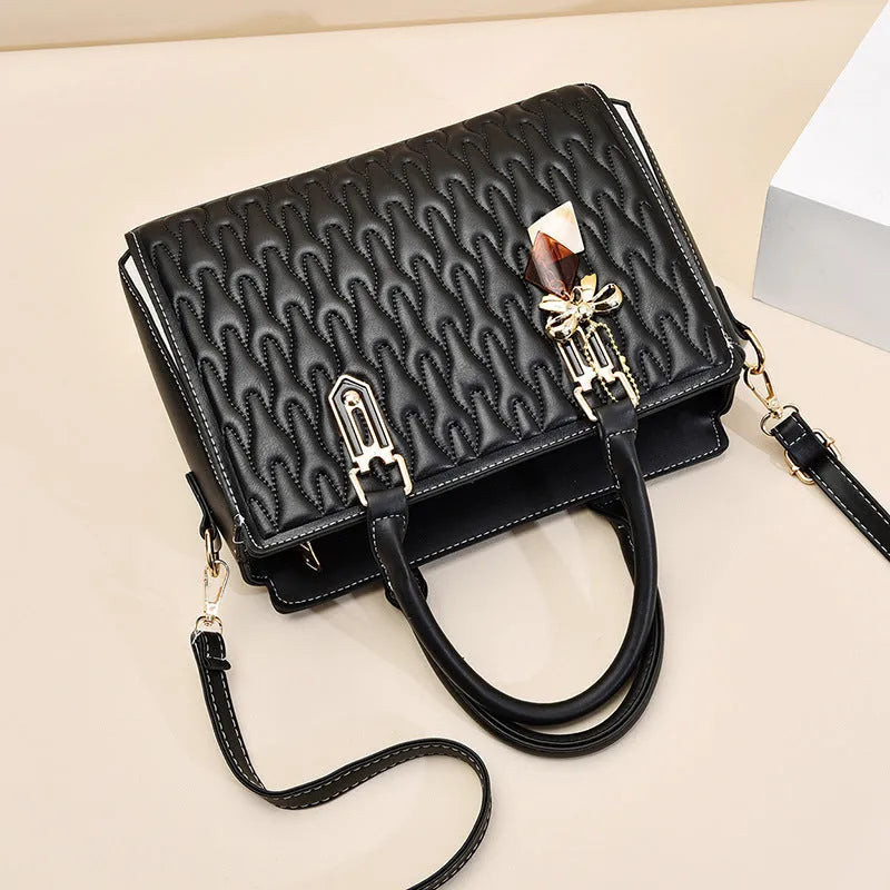 Women's simple shoulder messenger bag in black polyester with large capacity and internal pockets.