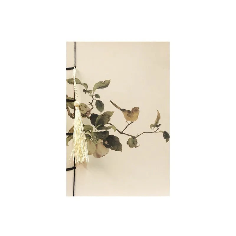 A5 antique wire-bound notebook with a retro famous painting cover on white cowhide, shown open on Kraft paper pages.