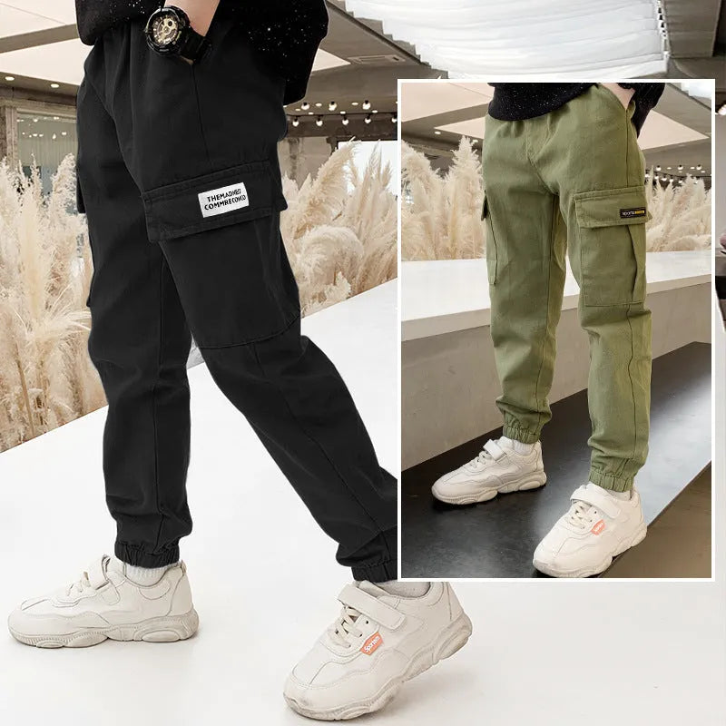 Boys' army green cotton casual trousers with long length, shown on a size chart