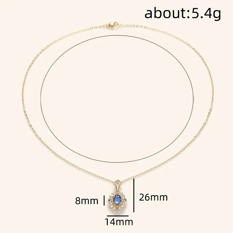 Yellow gold-colour adjustable box chain necklace with a mixed gemstone inlaid pendant on a white background.