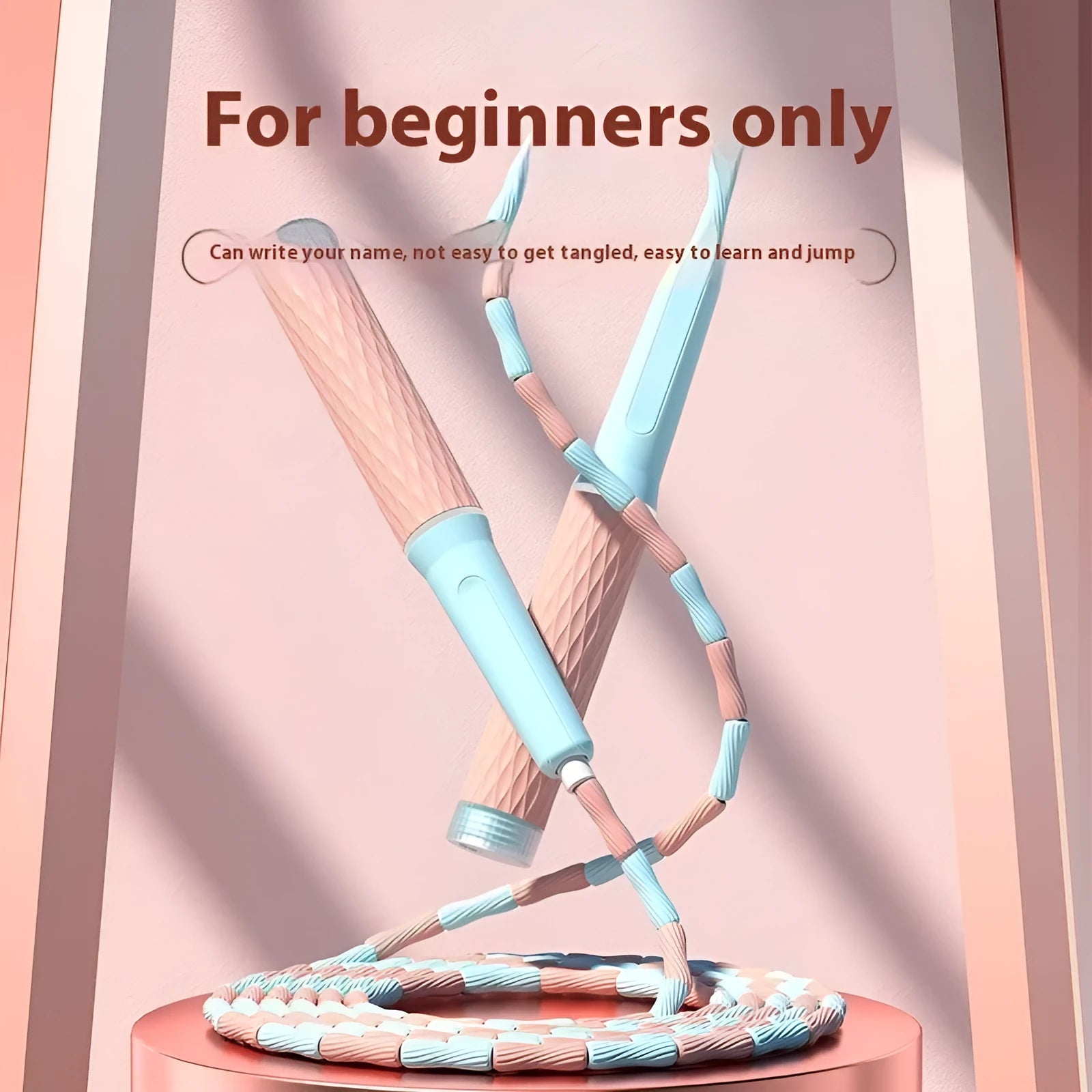 Children's skipping rope with soft blue bead handles and a non-knotted beaded cord.