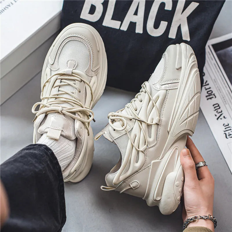 Men's beige low-top sneakers with mesh upper, platform rubber sole, and lace-up front